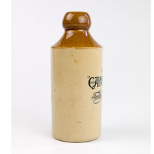 Left side view of CAMWAL Table Waters Stoneware Bottle