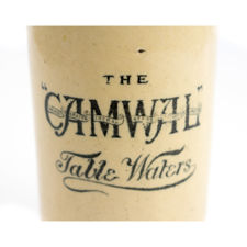 Close up logo  view of CAMWAL Table Waters Stoneware Bottle