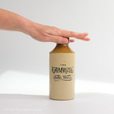 Size demonstration of CAMWAL Table Waters Stoneware Bottle