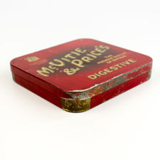 Angled left side view of 1930s McVitie & Price's Digestive Biscuit Tin