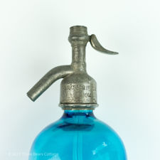Close up of engraved top on Brasserie La Bourgogne Blue Glass Soda Siphon