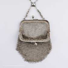 Open coin purse on  an Antique Silver Chainmail Mesh Evening Bag