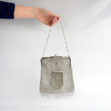 Size demonstration of an Antique Silver Chainmail Mesh Evening Bag & Purse