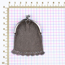 Size demonstration of a Solid Silver Chainmail Mesh Coin Purse