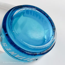 Close up of Made In France on a blue glass Gitanes ashtray