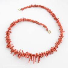 Open view of vintage red coral necklace