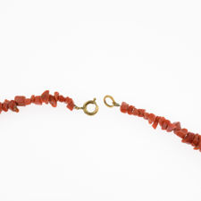 Close up of clasp on vintage red coral necklace