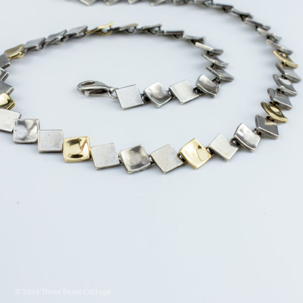 Main view of a vintage Silver, Brushed Silver & Gold Vermeil Square Necklace