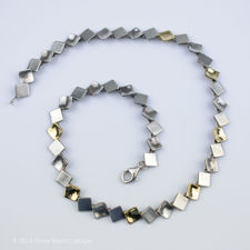 Second zoomed view of a vintage Silver, Brushed Silver & Gold Vermeil Square Necklace