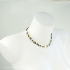 Angled fitting demonstration of a vintage Silver, Brushed Silver & Gold Vermeil Square Necklace