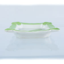 Left profile view of Haviland Limoges Porcelain Ashtray