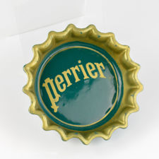 Angled view of Green and Yellow Perrier Bottle Cap Ashtray