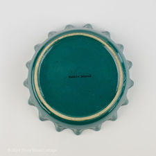 Underside view of Green and Yellow Perrier Bottle Cap Ashtray