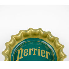 Top half of rim from Green and Yellow Perrier Bottle Cap Ashtray