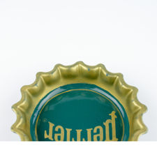 Bottom half of rim from Green and Yellow Perrier Bottle Cap Ashtray