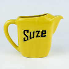 Right side view of a Yellow Moulin des Loups Suze Jug