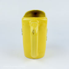 Rear view of a Yellow Moulin des Loups Suze Jug