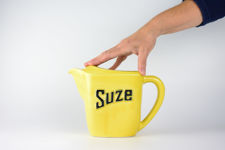 Size demonstration of a Yellow Moulin des Loups Suze Jug