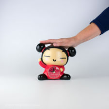 Size demonstration of Pucca Korean cartoon character alarm clock